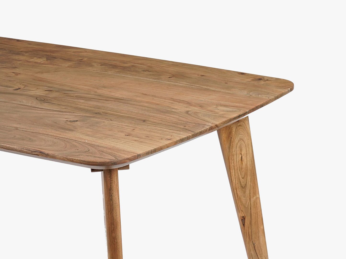 Close up of the side of the table showing part of the table top and legs