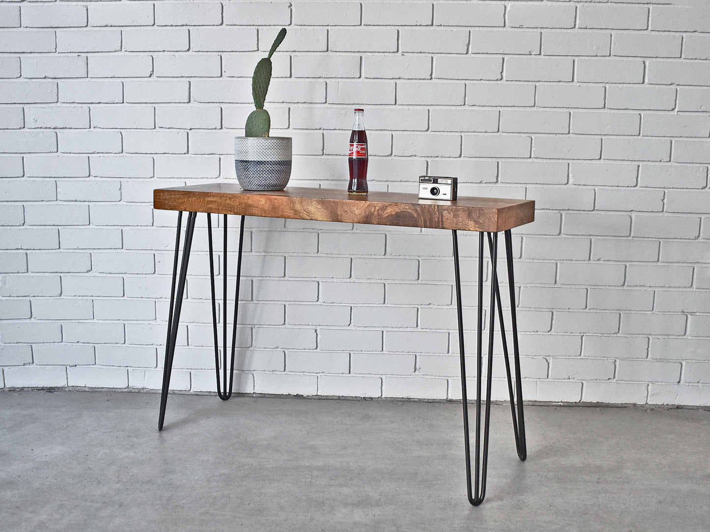 industrial hairpin leg console table with mango wood table top and metal legs