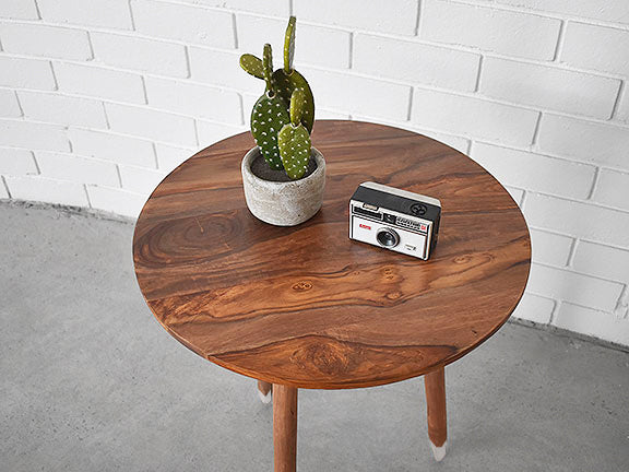 Close up showing the wooden table top and colour and grain