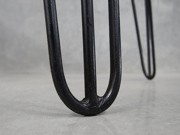 Close up of the bottom of the Black Metal Hairpin Legs
