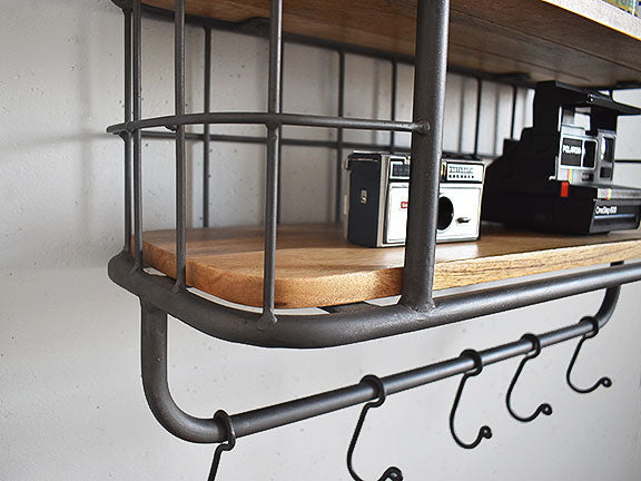 retro hanging shelf close up showing hooks and metal frame with wooden shelf