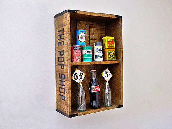 kitchen wall shelf with various retro items in it