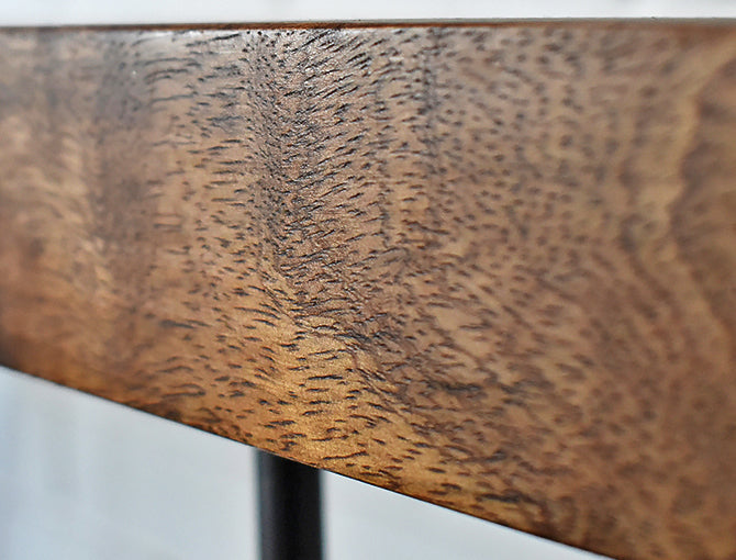 ultra close up showing mango wood detail graining on the table top