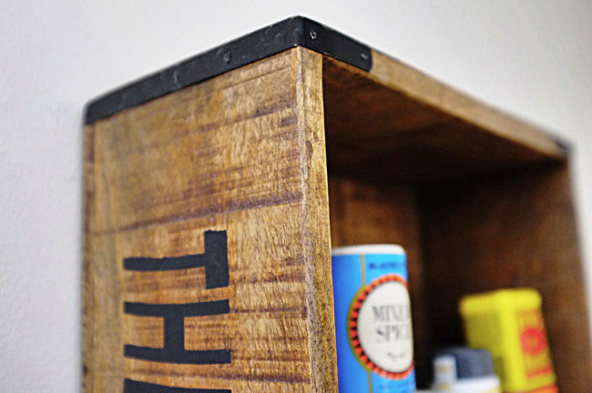 pop shop crate shelf close up of metal frame corner 